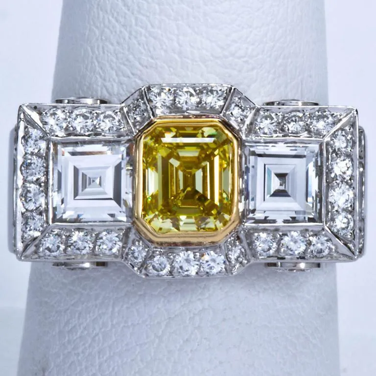 0.87 Carat Fancy Intense Yellow Emerald-cut Diamond Platinum Ring GIA