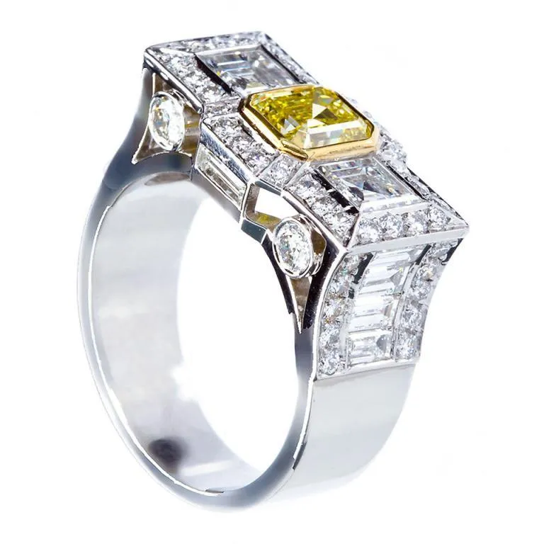 0.87 Carat Fancy Intense Yellow Emerald-cut Diamond Platinum Ring GIA