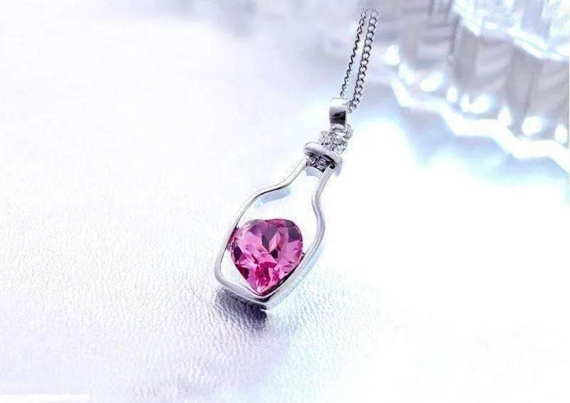 Bottled Up Love IOBI Crystals Necklace in Sapphire Pink