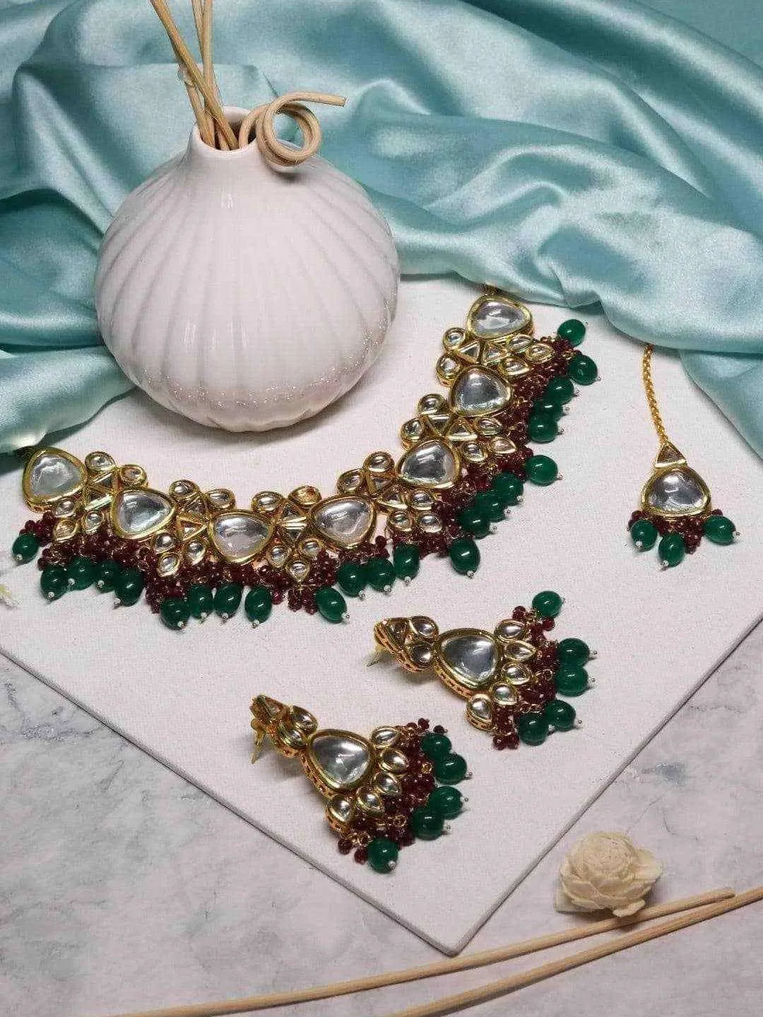 Diya Krishna In Triangular Kundan Pastel Set