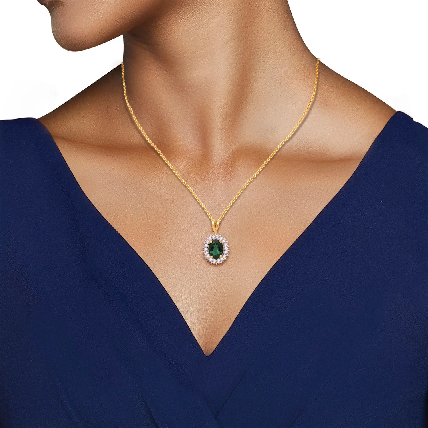 Jewelili Yellow Gold Over Sterling Silver With Oval Shape Created Emerald and Round Created White Sapphire Pendant Necklace