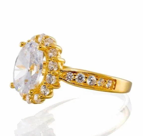 Oval Cut Fancy Halo Cubic Zirconia Engagement Ring In Yellow Gold Plated Sterling Silver