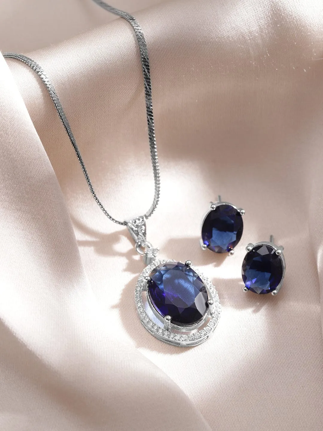 Rhodium-Plated Blue Sapphire & CZ Studded Oval Pendant Necklace Set